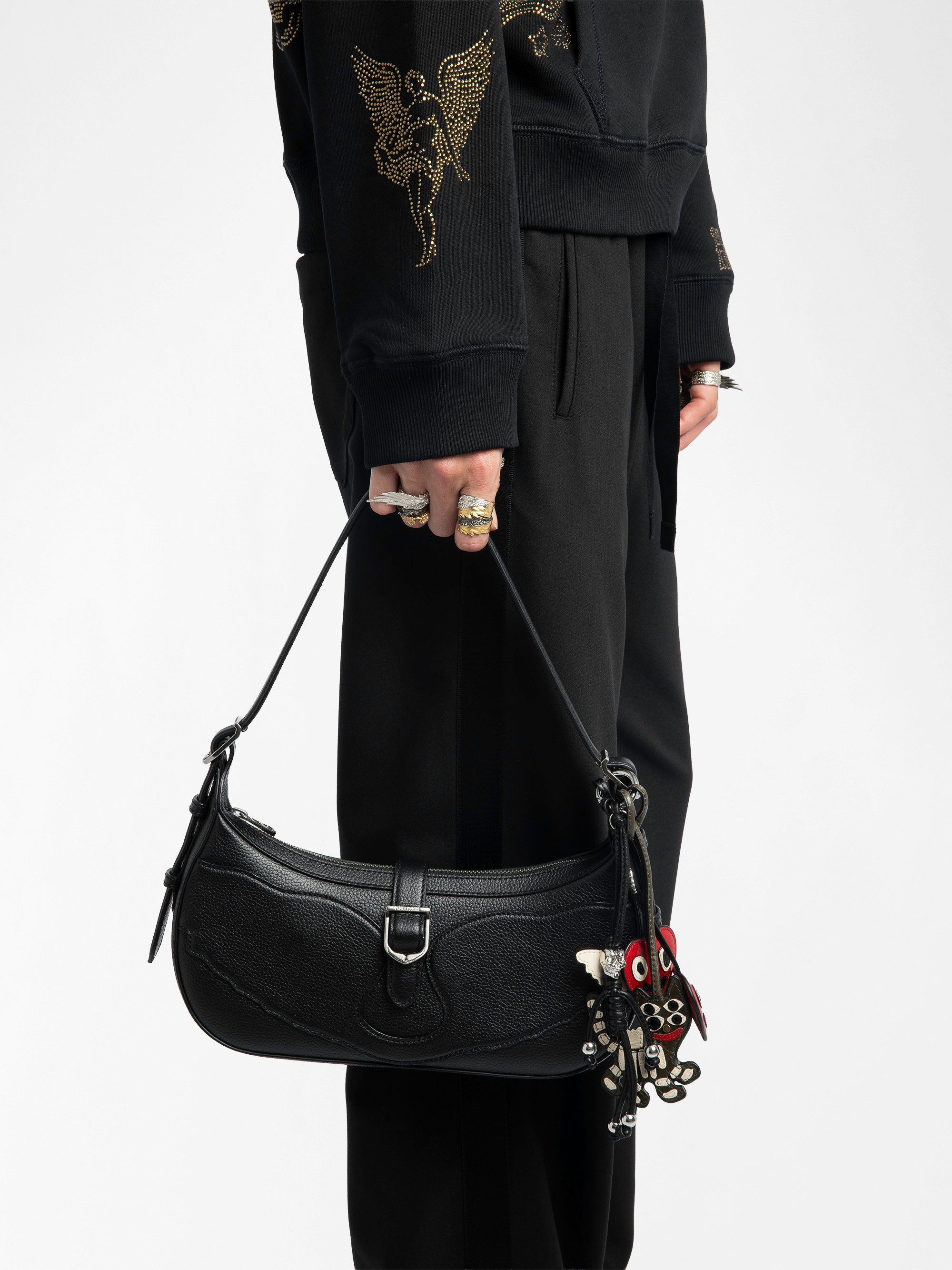 Moonrise Bag - Baguette bag in grained leather with signature wings.